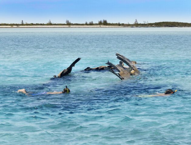 Two people snorkeling in Bahamas